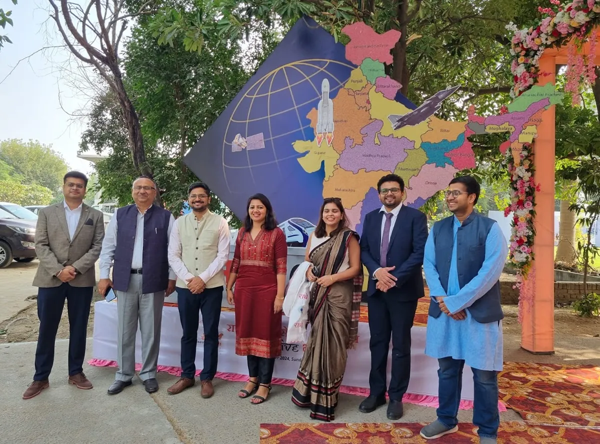 Delegates gathered beneath the Innovative Bharat globe installation